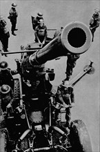 On target! - A 3.7 inch gun detachment at battle practice, 1943. Artist: Unknown.