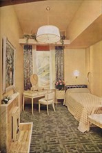 'Bedroom designed by Esmé Gordon, A.R.I.B.A., A.R.I.A.S., with Greek key design W Wilton Carpet by J Artist: Unknown.