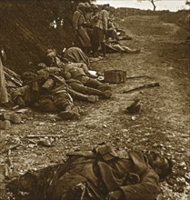 Bodies after the taking of Courcelles, northern France, 1918. Artist: Unknown.