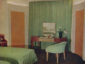 'A bedroom in a house at Portland Place, designed  by Ian Henderson & Co. of London', 1935. Artist: Unknown.