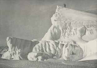 'On the Summit of an Iceberg', c1911, (1913). Artist: Herbert Ponting.