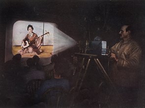 'Mr. Ponting Lecturing On Japan', c1910, (1913).  Artist: Unknown.