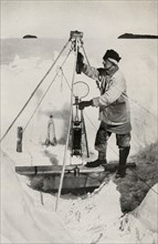 'E. W. Nelson with the Nansen-Petersen Insulated Water-Bottle', c1911, (1913). Artist: Herbert Ponting.