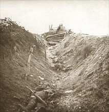 Destroyed tank and dead body, Auberives, France, c1914-c1918. Artist: Unknown.