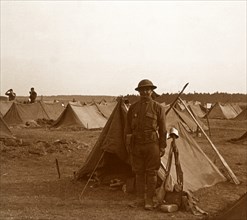 Soldier standing by tent, American camp, Melette, France, c1914-c1918.  Artist: Unknown.