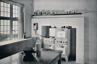 'Kitchen designed by R.W. Symonds', 1938. Artist: Unknown.