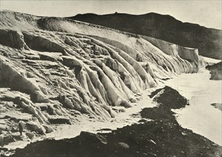 'Side of Ferrar Glacier. Figure of Man in Lower Left Corner', c1908, (1909).  Artist: Unknown.