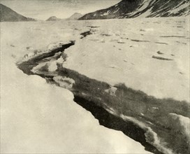 'Stream of Running Water in the Middle of the Ferrar Glacier in Midsummer', c1908, (1909).  Artist: Unknown.