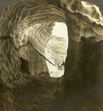'Looking through a snow-tunnel on a midsummer journey over Dyreskard Pass, Norway.', c1905. Creator: Unknown.
