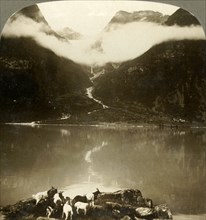 'Grytereids glacier glittering above drifting clouds,  across placid Lake Olden, Norway', c1905. Creator: Unknown.