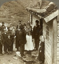 'A Nordfjord bride and groom with guests and parents at house door, Brigsdal, Norway', c1905. Creator: Unknown.