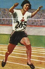 Japanese athlete Kinue Hitomi wins silver medal in the Women's 800 metres, 1928. Creator: Unknown.