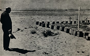 'At a Battlefield Cemetery in Egypt', 1942, (1945). Creator: Unknown.