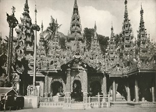 'Wood Carved Shrines with Glass Mosaic work at the Shwe Dagon Pagoda, Rangoon', 1900. Creator: Unknown.