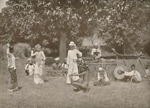'Burmese Musicians and Pwe Dancers', 1900. Creator: Unknown.