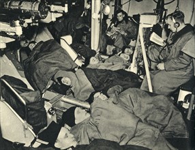 Royal Marines sleeping in the gunhouse of a warship, World War II, c1939-c1943 (1944). Creator: Unknown.