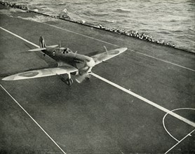 RAF Spitfire on the deck of an aircraft carrier on its way to Malta, World War II, 1942 (1944). Creator: Unknown.