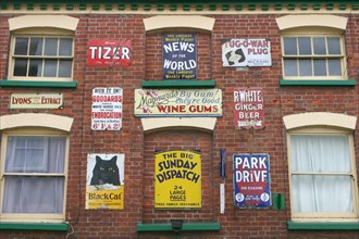 Advertisements on a building, Ross-on-Wye, Herefordshire