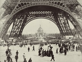 Beneath the Eiffel Tower, Paris, 1889. Artist: Unknown