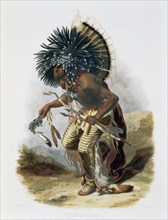 'Pehriska-Ruhpa, Minatarre Warrior in the Costume of the Dog Dance', 1843. Artist: Rene Rollet