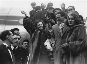 Édith Piaf, Marcel Cerdan and Mathilda Nail arriving at Orly Airport, France, 17 March 1948. Artist: Unknown