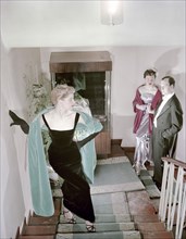 Female model shows an evening dress, Stockholm, 1950s. Artist: Göran Algård