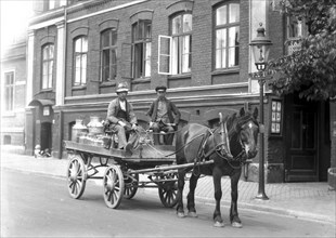 Transporting milk by horse and cart, Landskrona, Sweden, 1915. Artist: Unknown