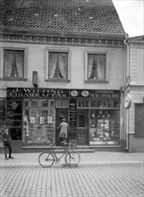 Tobacconist's and horologist's shops, Landskrona, Sweden, 1920. Artist: Unknown