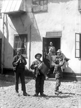 Young backyard musicians, Landskrona, Sweden 1910. Artist: Unknown