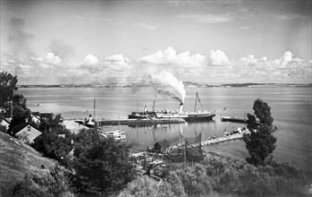 Steamboat in the harbour of Bäckviken, Isle of Ven, Sweden, 1925. Artist: Unknown