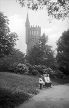 The water tower and four children on a bench in the park, Landskrona, Sweden, 1925. Artist: Unknown