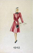 Model in a suit, holding a handbag, 1945. Artist: Unknown