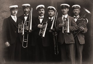 Amorosa, musical sextet, with their brass instruments, Landskrona, Sweden, 1910. Artist: Unknown