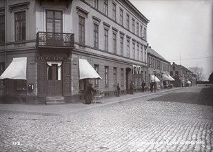 People walking on Queen's street, Landskrona, Sweden, 1900. Artist: Borg Mesch
