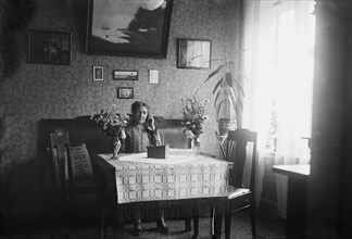 Woman listening to her crystal radio set, Sweden, 1927. Artist: Unknown