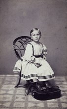 Studio portrait of a 3 year old girl, c1870. Artist: Unknown