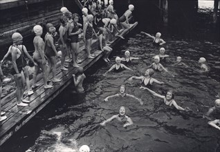 Girls' swimming class, Sweden, 1939. Artist: Otto Ohm