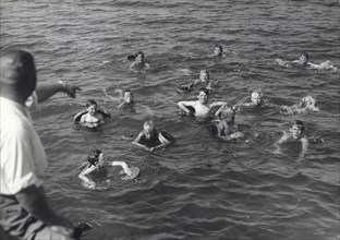 Boys having a swimming lesson, Sweden, 1939. Artist: Otto Ohm