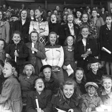 Supporters at a school sports match, Trelleborg, Sweden, 1950. Artist: Unknown