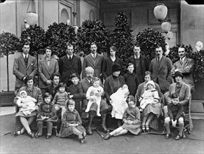 The 9th Duke of Devonshire with his children and grandchildren at Chatsworth, Christmas 1925. Artist: JR Board