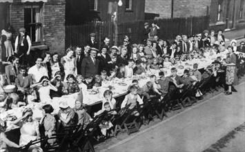 VE Day party, Dunstan Street, Netherfield, Nottinghamshire, May 1945. Artist: Unknown