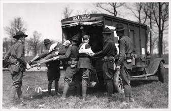 Two wounded soldiers being helped into an ambulance, Fort Sheridan, Illinois, USA, 1930. Artist: Unknown