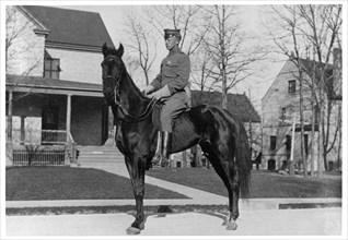 George S Patton, American soldier, on horseback, Fort Sheridan, Illinois, USA, 1910. Artist: Unknown