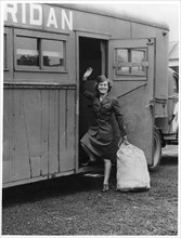 A WAAC boarding a bus, Fort Sheridan, Illinois, USA, 1940. Artist: Unknown