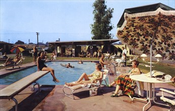 Guests relaxing by the swimming pool, 20th Century Motor Lodge, Glendora, California, USA, 1958. Artist: Unknown