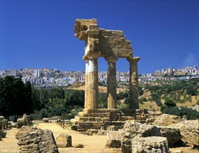 Temple of Diosuri, Agrigento, Sicily, Italy. Agrigento town behind.