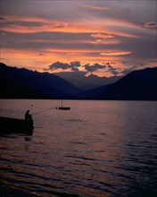 Fishing at sunset, Lake Maggiore, Italy.