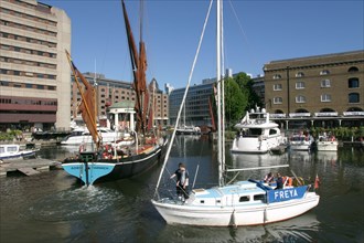 Boats in St Katherine's Dock, London.