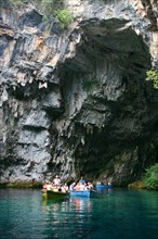 Tourist boat trip, Melissani Lake, Kefalonia, Greece.