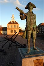 Statue of Captain Vancouver at dusk on the Purfleet Quay, King's Lynn, Norfolk.